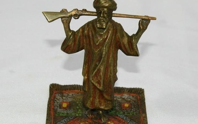 1900 AUSTRIAN PATINATED BRONZE OF ARAB & HIS RIFFLE ON A RUG