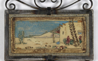 Arts and Crafts framed Claycraft tile, depicting an adobe scene with cactus in the desert, and framed in a silvered and wrought iron...