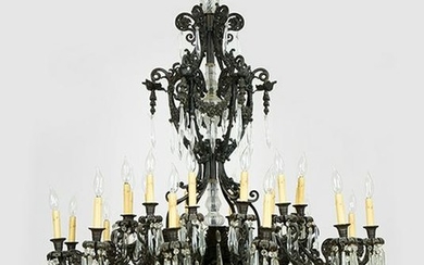 A Bronze and Crystal 24-Light Chandelier.