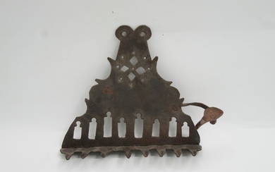 Drilled iron Chanukah menorah. North Africa