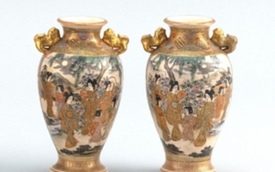 PAIR OF SATSUMA VASES In baluster form, with lion-form handles and figural decoration. Black mark signature. Heights 4.6".