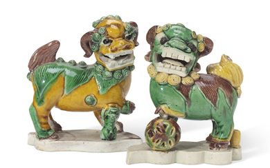 A PAIR OF CHINESE FAMILLE VERTE BISCUIT BUDDHIST LION JOSS-STICK HOLDERS, KANGXI PERIOD (1662-1722)
