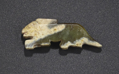 A DARK GREEN JADE RABBIT-FORM PENDANT, LATE SHANG-EARLY WESTERN ZHOU DYNASTY, 11TH-10TH CENTURY BC
