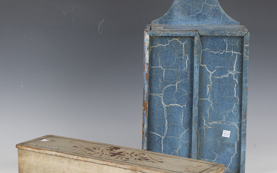A 19th century blue painted primitive wall hanging candle box with two sliding lids, height 47cm, to