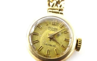 A 9ct gold Bernex wristwatch, on integral belcher link...