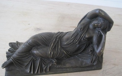 A Bronze Figure of a Reclining Lady