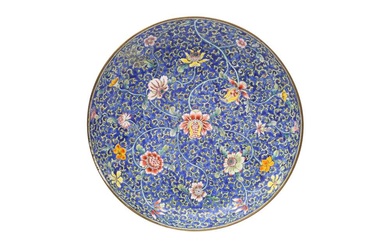 A CHINESE CANTON ENAMEL BLUE-GROUND 'BLOSSOMS' DISH 清十九世紀 廣東銅胎畫琺瑯藍地花卉紋圖盤