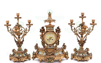 A CLOCK AND A PAIR OF CANDELABRA
