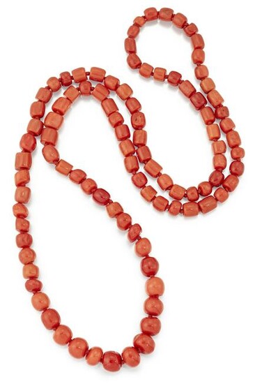 A CORAL BEAD NECKLACE, the individually knotted strand