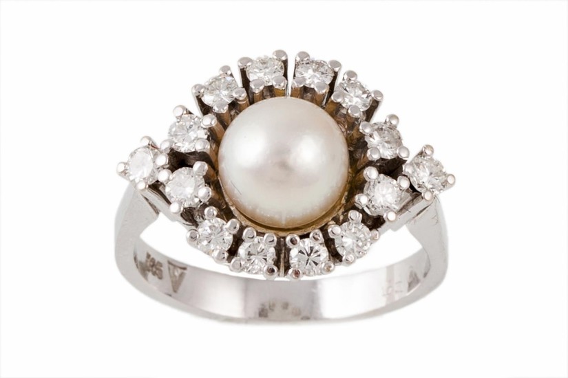 A CULTURED PEARL AND DIAMOND CLUSTER RING, with diamonds of ...