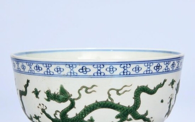 A Chinese Blue and White Dragon Carved Porcelain Bowl