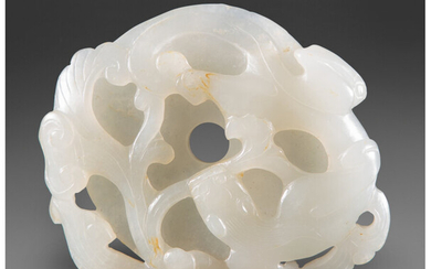 A Chinese Carved White Jade Chilog and Lingzhi Form Bi Disc