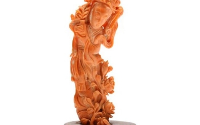 A Chinese Coral Carving of Guan Yin with Stand