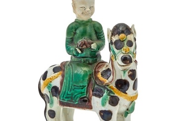 A Chinese Glazed Biscuit Porcelain Figure Kangxi Period