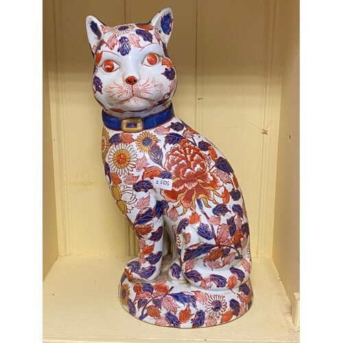A Chinese Imari decorated model of a seated cat