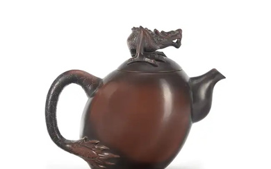 A Chinese Yixing teapot with moulded dragon finial 20th century Of tilted...