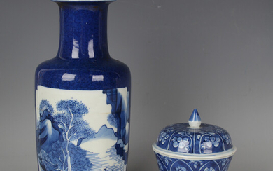 A Chinese blue and white porcelain rouleau vase, Kangxi style but later, the body painted with oppos
