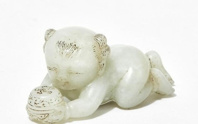 A Chinese carved jade figure of a baby