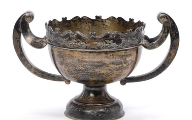 A Chinese export silver bowl cast with leaves, handles and raised on...