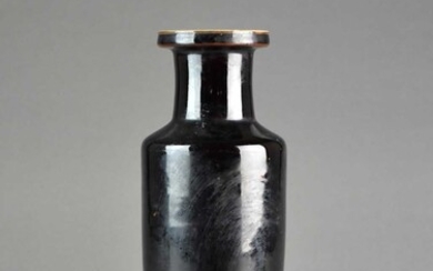 A Chinese ‘mirror black’ monochrome glazed rouleau vase, 19th century