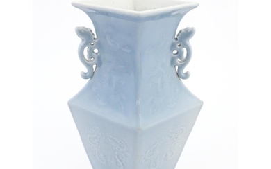 A Chinese vase of angular baluster form with a pale blue gro...