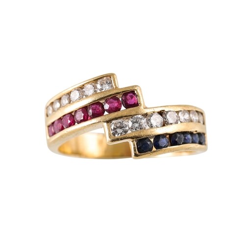 A DIAMOND, SAPPHIRE AND RUBY CLUSTER RING, of cross over des...