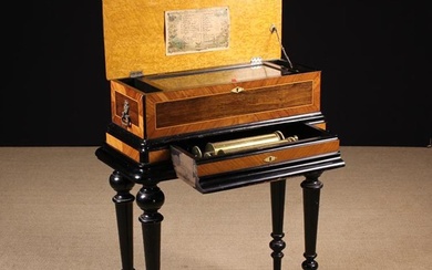 A Fabulous 19th Century Inlaid Musical Box on Table Stand. The lid inlaid with a marquetry floral sp