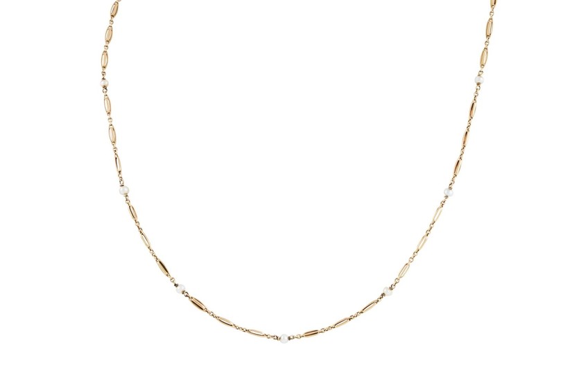 A GOLD NECKLACE SET THROUGHOUT WITH SEED PEARLS, total weigh...