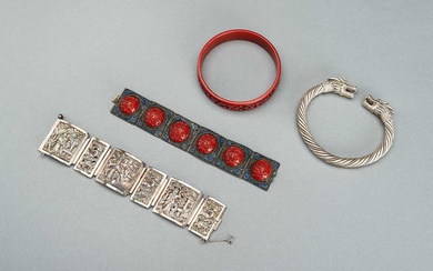 A GROUP OF FOUR METAL, SILVER-PLATED, AND CINNABAR LACQUER BRACELETS