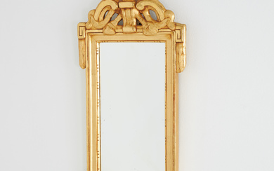 A Gustavian mirror, carved in wood and openwork decoration, second half of the 18th century.