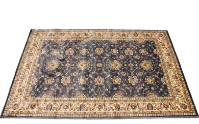 A Kashmir rug, all over floral design, upon a sky blue groun...