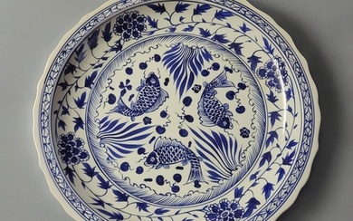 A LARGE CERAMIC CHINESE BLUE AND WHITE CHARGER Decorated wit...