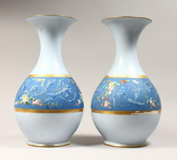 A LARGE PAIR OF CONTINENTAL LIGHT BLUE BULBOUS VASES