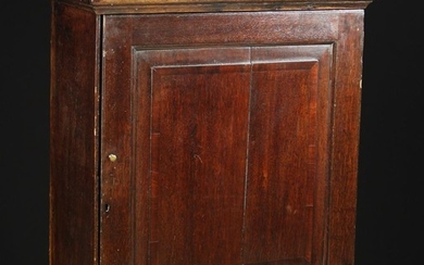 A Late 18th/Early 19th Century Oak Table Cabinet. The fielded panel door inlaid with mahogany bandin