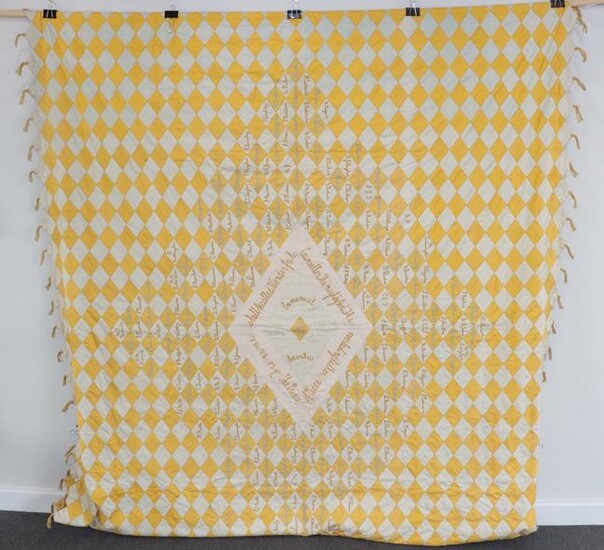A Late 19th Century Decorative Signature Quilt, comprising yellow and...