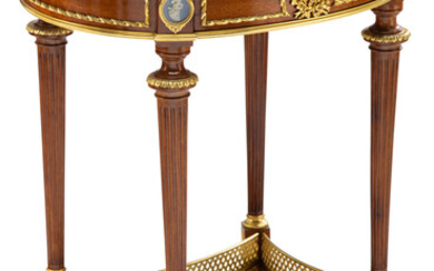 A Louis XVI-Style Gilt Bronze and Porcelain Mounted Mahogany Side Table with Marble Top