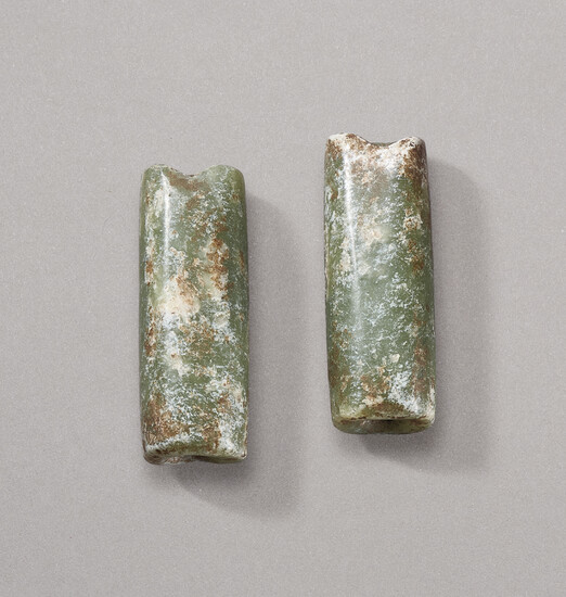 A PAIR OF MOTTLED GREEN JADE TUBULAR ORNAMENTS, NEOLITHIC PERIOD (CIRCA 6500-1700 BC)