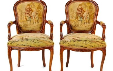 A Pair of Louis XV Fruitwood Fauteuils Height 37