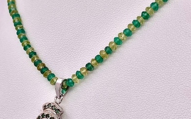A Peridot & Green Onyx Beaded Necklace with Pendant...