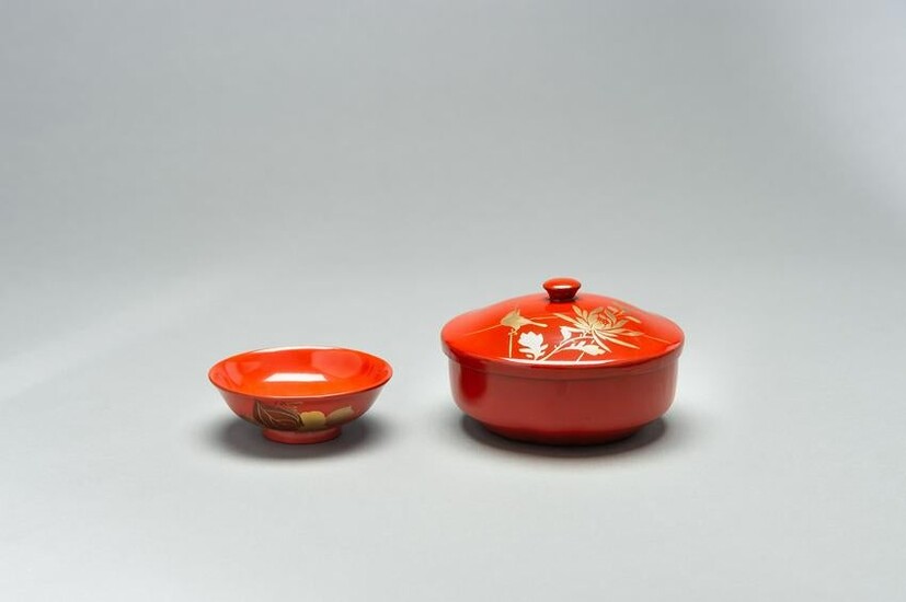 A RED LACQUER BOWL WITH COVER AND A SMALL DISH