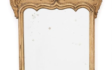 A Regency mirror in a frame of later gilded wood and with...