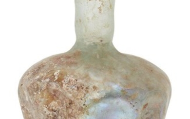 A Roman glass vessel, Rhineland, circa 3rd-4th century AD., with...