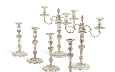 A SET OF FOUR GEORGE III SILVER CANDLESTICKS AND A...