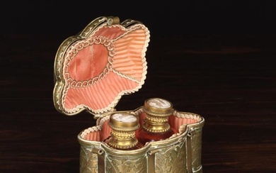 A Small 19th Century Brass Perfume Casket with lobed sides, intricately embossed & chased with scrol