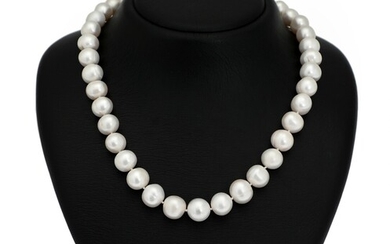 SOLD. A South Sea pearl necklace set with numerous cultured South Sea pearls and clasp...