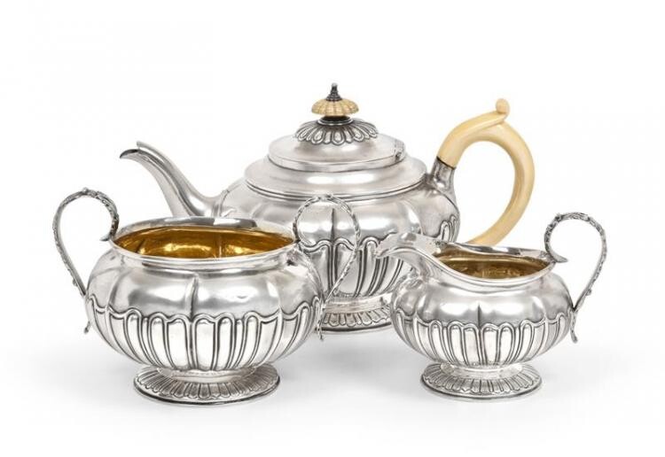A Three-Piece George III and George IV Silver Tea-Service, by...
