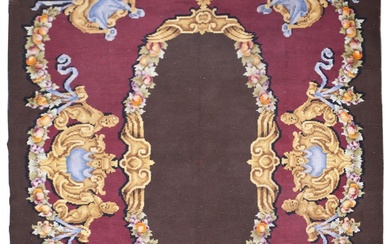 A Turkish knot Spanish carpet with burgundy ground and...