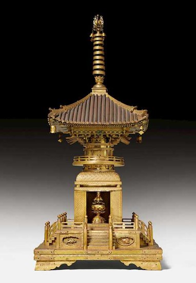 A VERY RARE BUDDHIST RELIQUARY IN THE SHAPE OF A PAGODA.
