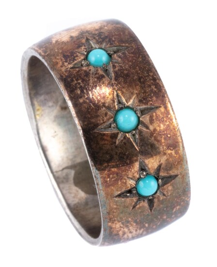 A VINTAGE SCANDANAVIAN SILVER STONE SET RING; with 9ct gold overlay star set with 3 cabochon turquoise, width 8.94mm, size O.