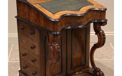 A Victorian figured walnut davenport with integral Japanned ...